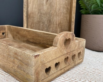 Mango wood slim trays with cutout hearts in 2 sizes. Useful for cutlery. condiments, table mats, or as a regular tray.