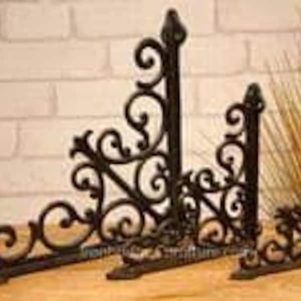 Pair of cast iron brackets - ideal for shelving and hanging baskets.