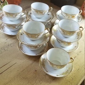 Vintage Noritake Tea Cups and Saucers; Set of 11 + 1 Saucer; Hand Painted; Made in Japan