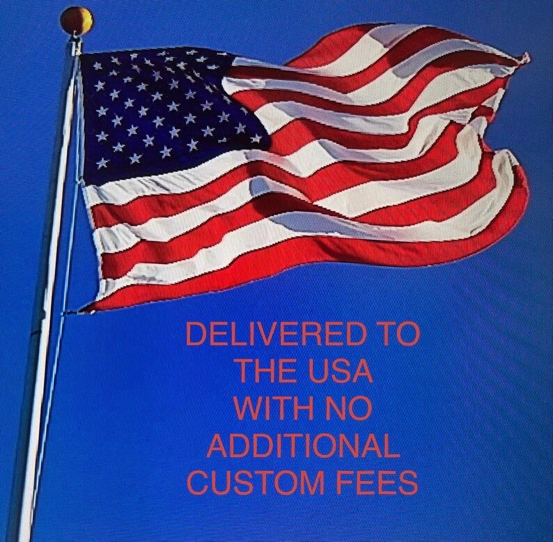 May include: The flag of the United States of America features thirteen horizontal stripes of alternating red and white, with a blue canton containing fifty white stars. The text DELIVERED TO THE USA WITH NO ADDITIONAL CUSTOM FEES is visible.