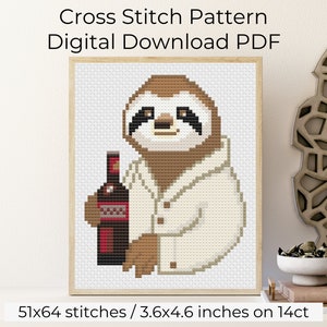 May include: Cross stitch pattern PDF download of a brown sloth wearing a white shirt and holding a bottle of wine. The pattern is 51x64 stitches and measures 3.6x4.6 inches on 14 count Aida cloth.