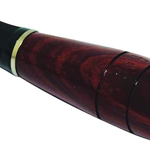 May include: A wooden cigarette holder with a black mouthpiece and a dark red wood grain finish.