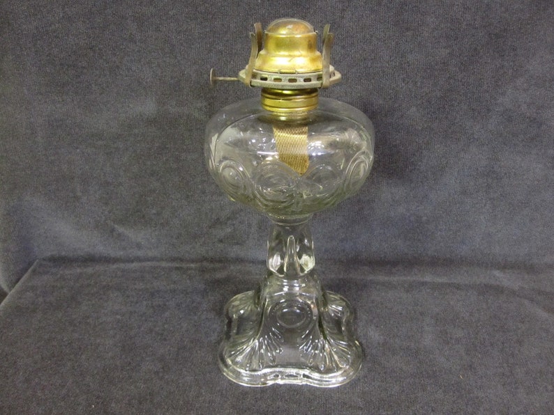 bullseye oil lamp soft detail c. 1913the dominion glass | etsy
