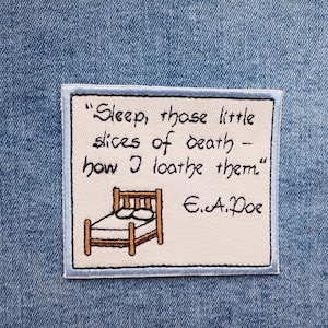 May include: Embroidered patch with a quote from E.A. Poe: "Sleep, those little slices of death - how I loathe them." The patch features a small bed illustration and is set against a denim background.