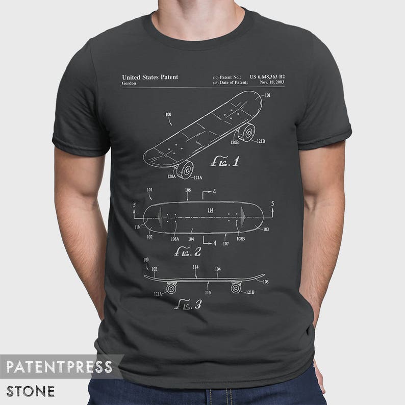 May include: A dark gray t-shirt with a white print of a skateboard patent design. The patent number is US 6,648,363 B2 and the date of the patent is Nov. 18, 2003. The text "United States Patent" and "Gordon" are also printed on the shirt.