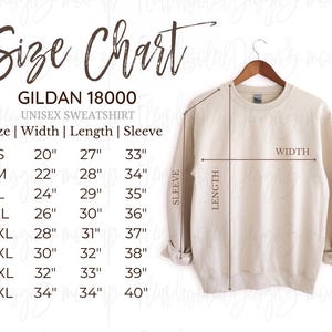 May include: A beige Gildan 18000 unisex sweatshirt displayed on a wooden hanger. The image includes a size chart with measurements in inches for sizes S through 5XL, detailing width, length, and sleeve dimensions.