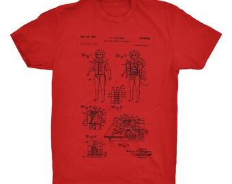 Surgery Doll Patent T-Shirt. Creepy Toy Patent Shirt from 1951. Ringspun Cotton Tee. Unisex. Comfy. Sizes S-3X. Black, Red, White, or Gray.