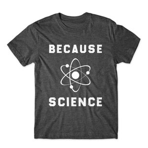 May include: Dark gray t-shirt with white text that reads "Because Science" and a white atom symbol.