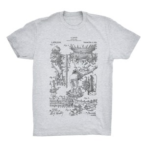 Houdini Divers Suit Patent. Harry Houdini. Scuba Diving. Magician. Ringspun Cotton Tee. Unisex. Sizes S-3X. Black, Red, White, or Gray.