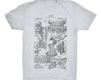 Houdini Divers Suit Patent. Harry Houdini. Scuba Diving. Magician. Ringspun Cotton Tee. Unisex. Sizes S-3X. Black, Red, White, or Gray.