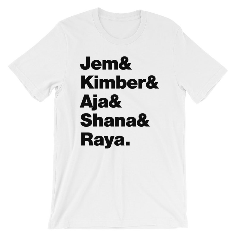 May include: White t-shirt with black text that reads "Jem & Kimber & Aja & Shana & Raya."