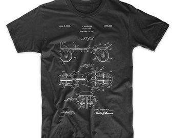 Roller Skate Patent T-Shirt. Roller Derby Tee. Roller skates.  Ringspun Cotton. Unisex. Sizes S-3X. Available in Black, Red, White, or Gray.