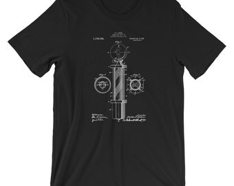 Barber Pole Patent T-Shirt. Barber Gifts. Barber Clothing Ringspun Cotton Tee. Unisex. Sizes S-3X. Available in Black, Red, White, or Gray.
