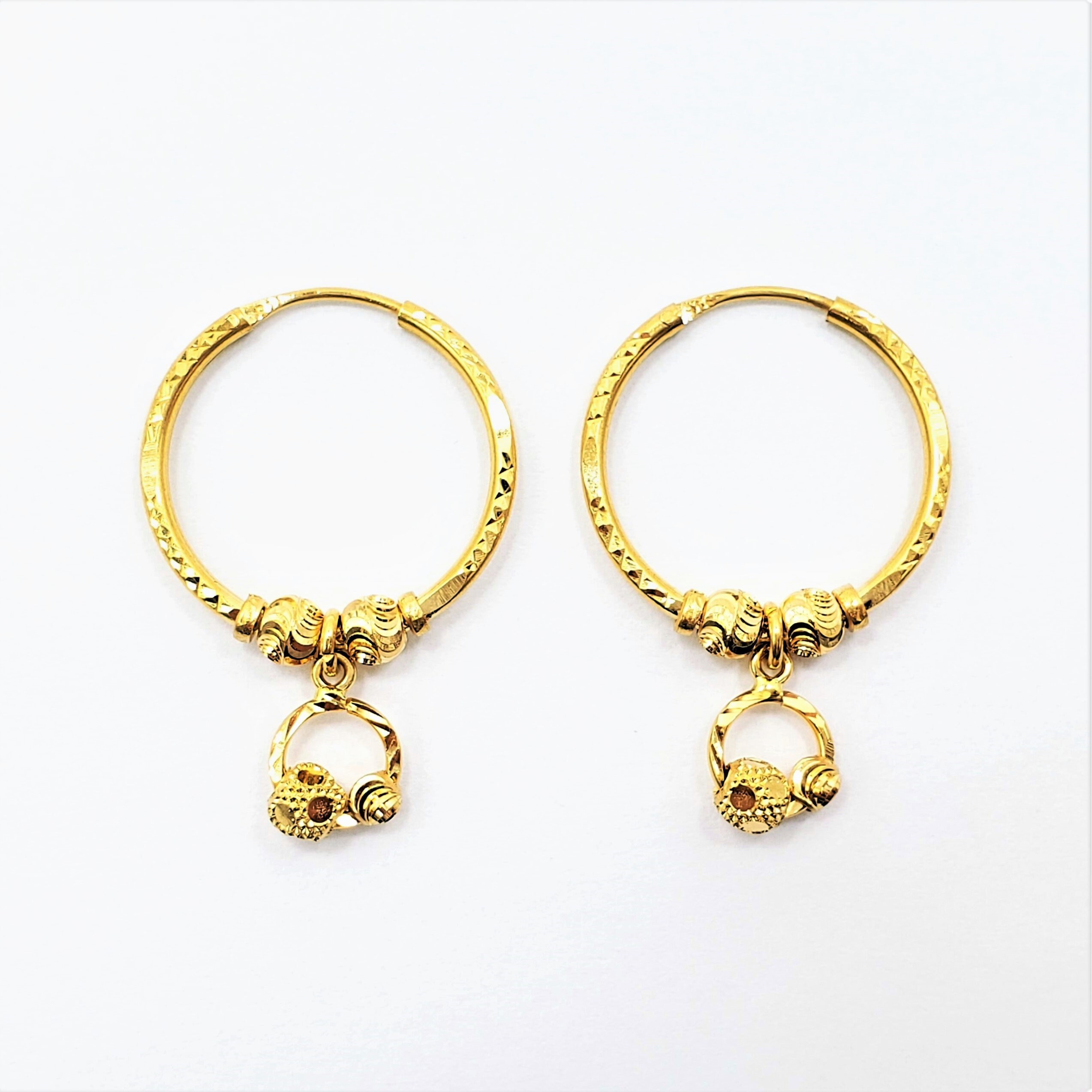 Signature Swinging Hook Earrings in Yellow Gold