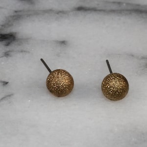 Ronde gouden oorknopjes