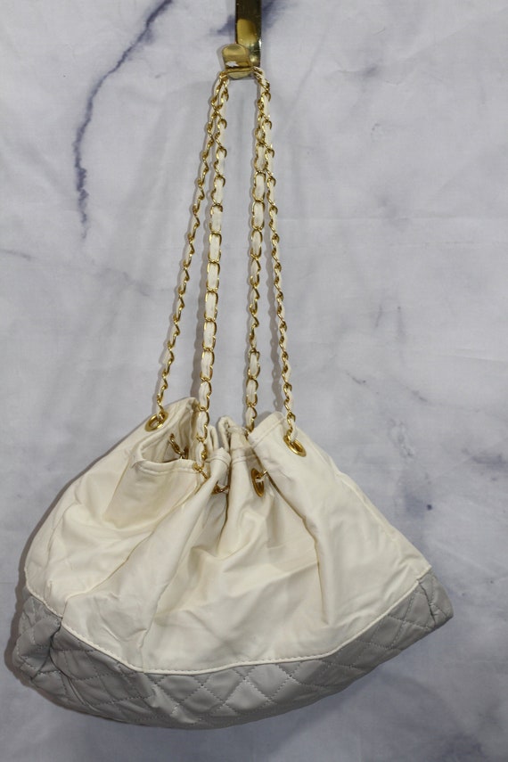 White and top gold tote bag