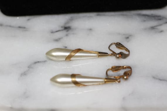 Gold Pearl Dangle Clip On Earrings - image 1