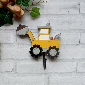 wooden digger wall hook in construction themed boys bedroom