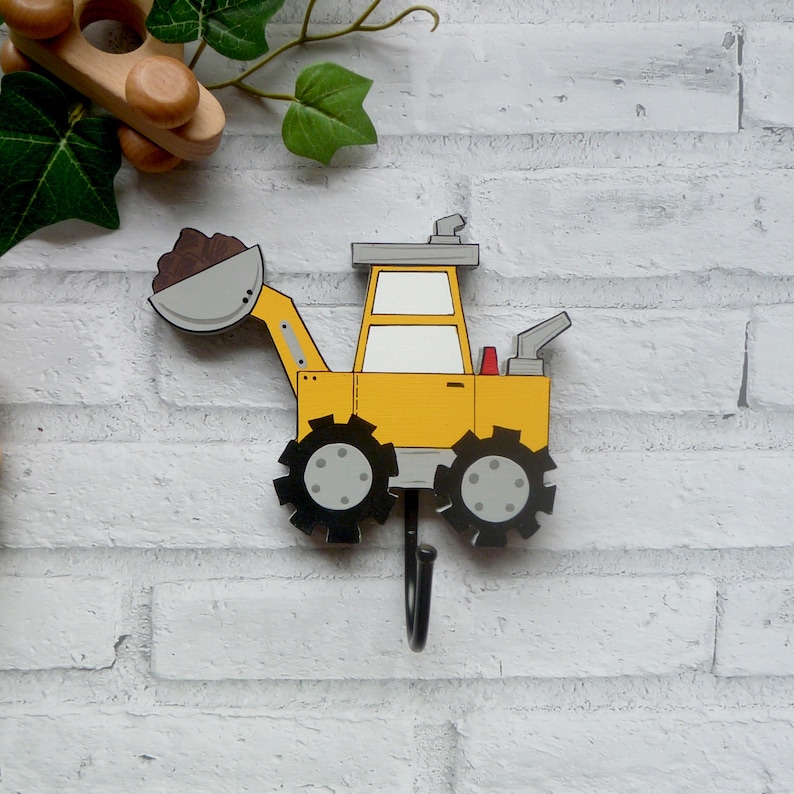 wooden digger wall hook in construction themed boys bedroom