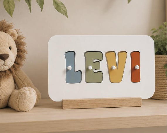 129 favorites is a loud signal — this personalized baby name puzzle clearly hits as a go-to baby shower gift that's genuinely hand-crafted.