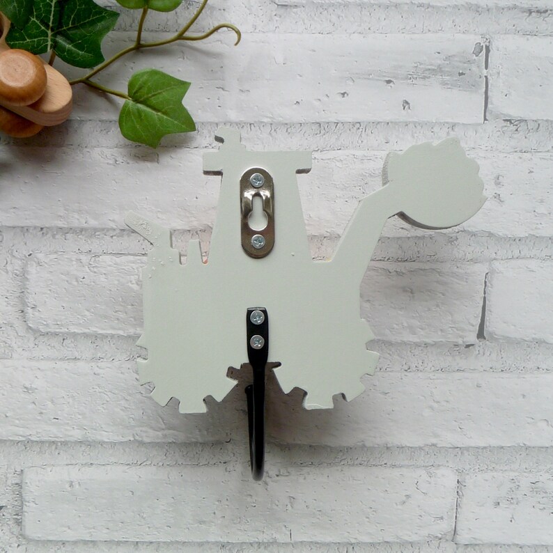 Wooden digger wall hook showing wall mounting hardware for kids room