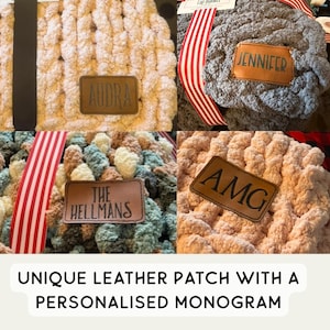 May include: A collage of chunky knit blankets in various colors, each featuring a personalized leather patch with a name or initials. The blankets are in shades of pink, gray, and a mix of blues and browns. The text at the bottom reads: UNIQUE LEATHER PATCH WITH A PERSONALISED MONOGRAM.