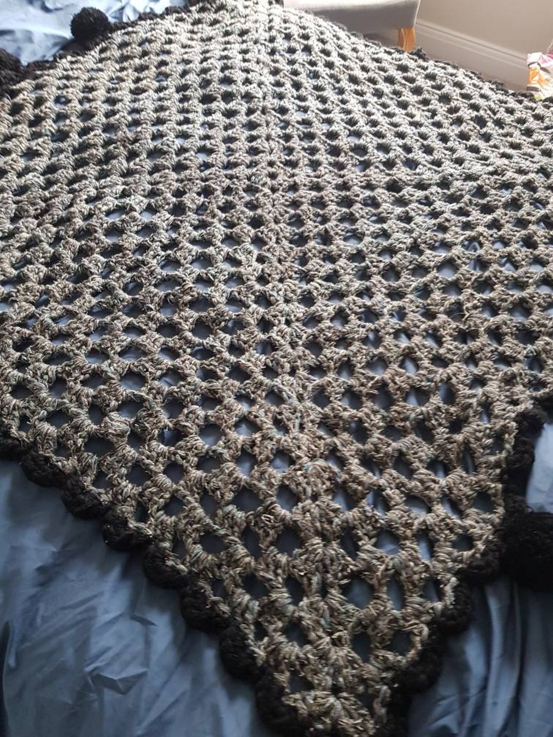 Grey granny square blanket with large black pompoms Etsy