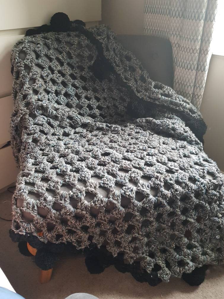 Grey granny square blanket with large black pompoms Etsy
