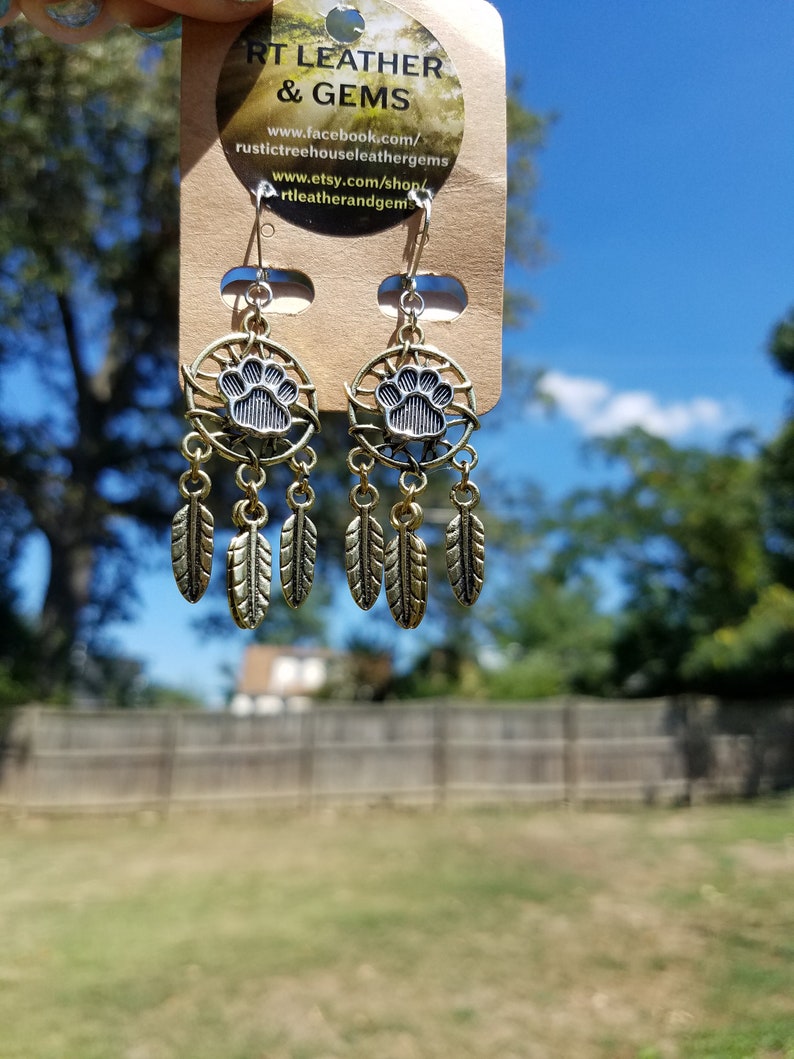 southwestern western fashion feather charms gypsy cowgirl Boho desert vibes dog lover Paw Print Dreamcatcher two toned Earrings