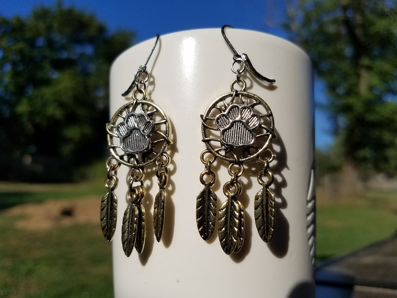 southwestern western fashion feather charms gypsy cowgirl Boho desert vibes dog lover Paw Print Dreamcatcher two toned Earrings