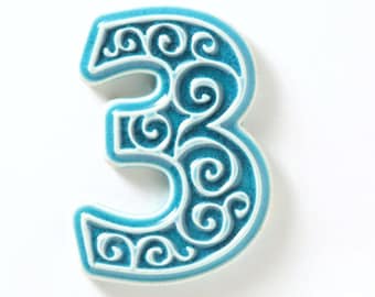 apartment number, number 3 turquoise