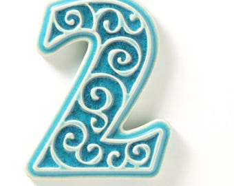 apartment number, number 2 turquoise