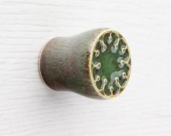 Ceramic small knob for furniture No.9, dark green with brown speckles effect.
