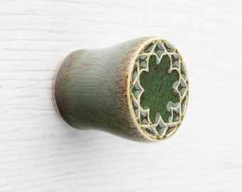Ceramic small knob for furniture No.14, dark green with brown speckles effect.