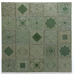 25 ceramic tiles with ornaments , dark green