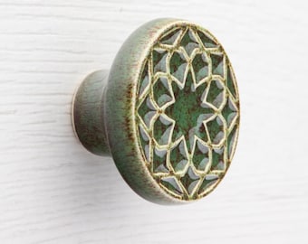 ceramic knob for furniture No.1, dark green with brown speckles effect.