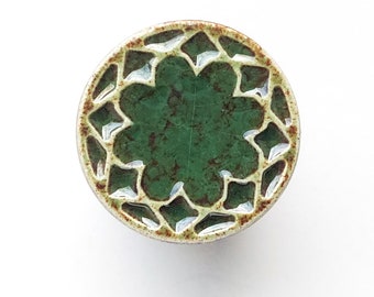 Ceramic small knob for furniture No.14, dark green with brown speckles effect.