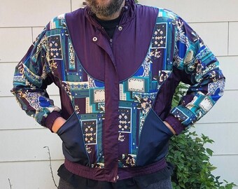 Jaqueta corta-vento vintage LAVON azul-petróleo roxo branco azul geométrico abstrato Médio dos anos 80