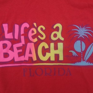 Vintage anni '80 "Life's a Beach" Florida Paper Thin souvenir / cucitura singola + t-shirt super morbida / Made in USA da Trench / Small