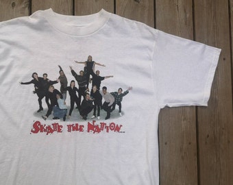Vintage 1997 "Skate the Nation" Canadian Figure Skating Tour / Elvis Stojko / Brian Orser t-shirt / Made in USA by Tultex / XL