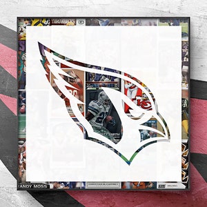May include: A white silhouette of a cardinal bird head with a wing, created from a collage of various sports trading cards. The cards feature images of football players and team logos.