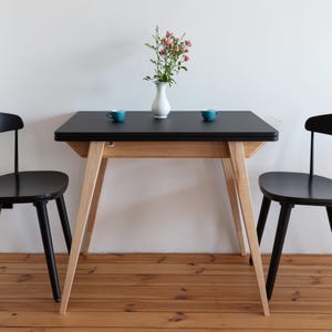 Litet utdragbart bord Kuvert för 4 till 6 personer, olika färger