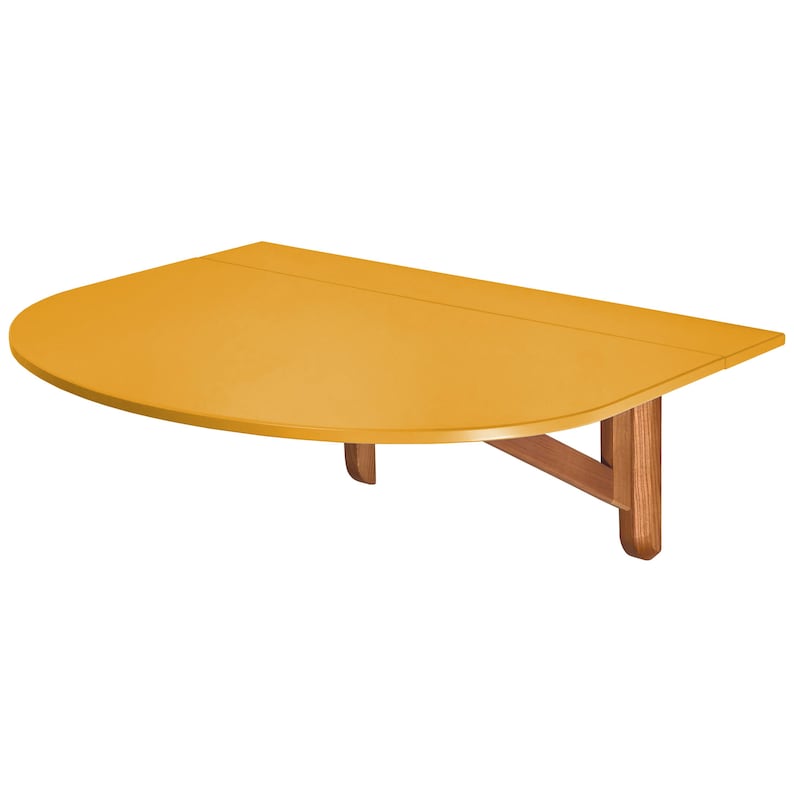 May include: Mustard yellow, half-circle wall-mounted table with wooden support brackets. The table has a smooth, glossy finish and is designed to be mounted on a wall. The table is approximately 30 inches wide.
