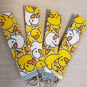 Patito de goma, llavero de pulsera con diseño de patos de crucero