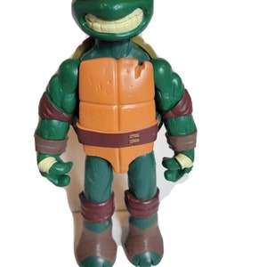 Peluche Michelangelo Tortues Ninja Playmates Toys Teenage Mutant Ninja  Turtles – le Comptoir du Geek