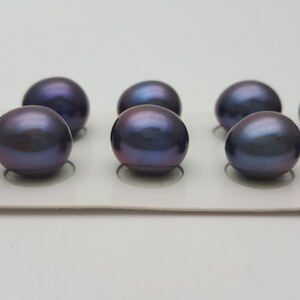 Perlas negras de agua dulce: forma ovalada con perforación parcial (paquete de 2)
