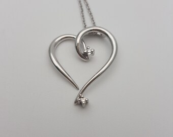 Classic beautiful young heart shape 18K white gold and diamond pendant  chain included!