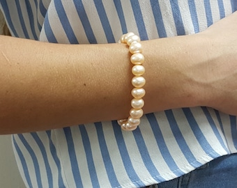 Handmade Orange Pearl Bracelet: Natural Freshwater Pearls, Elastic Strand