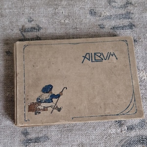Antique album for children's photos or postcards around 1920 from the Art Nouveau period Shabby vintage from France