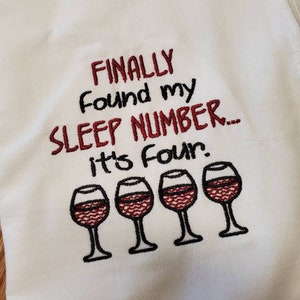 Embroidered dish towel. Finally found my sleep number it&#39;s 4, with wine glasses